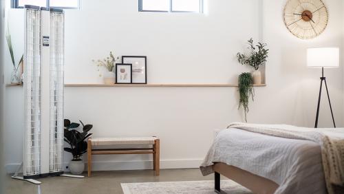 Panosol 6 home phototherapy panel in a bedroom.